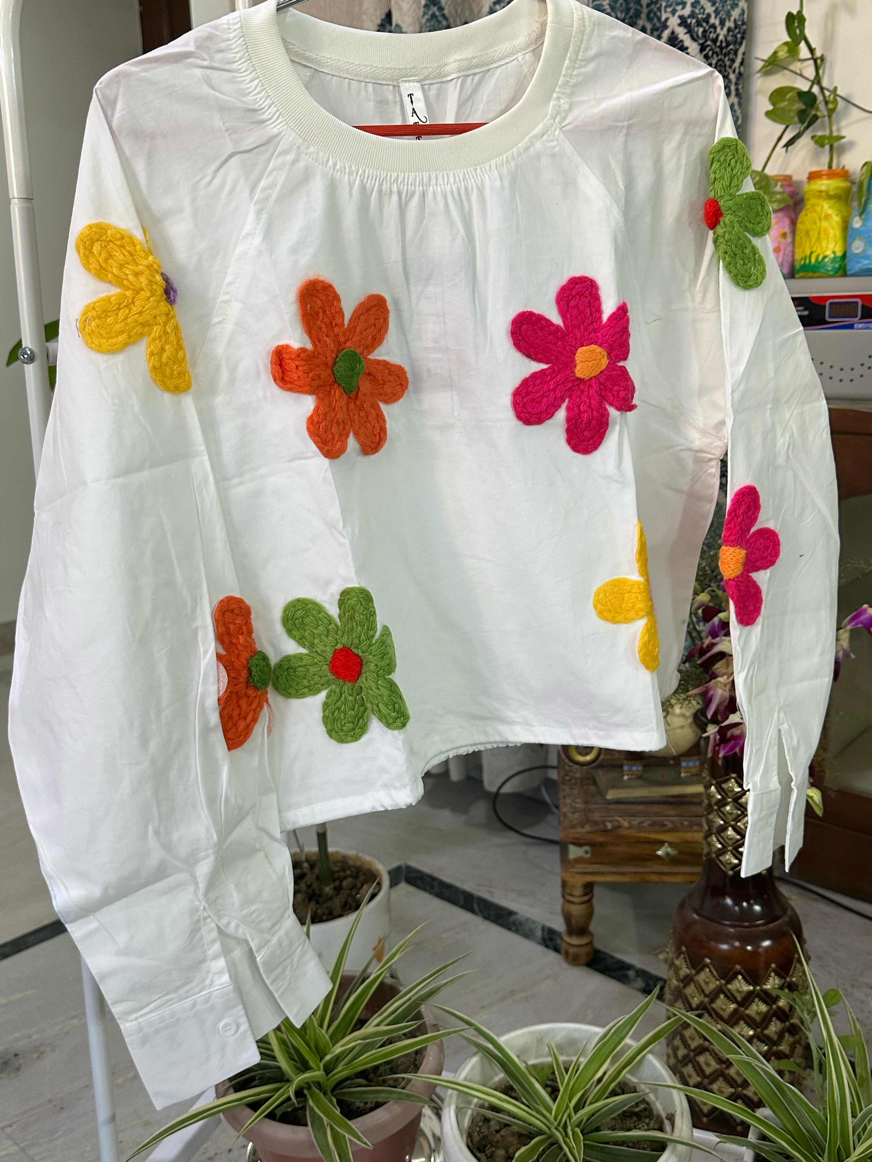 White colored Round neck crop top with rainbow flower woolen